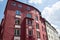 renovated old building, red facade, rental apartments, condominiums