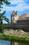 Renovated old historical buildings  of Fagaras Fortress Cetatea Fagaras during renovation works in a sunny summer day, in