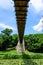 Renovated suspended metallic bridge in Nicolae Romaescu park from Craiova in Dolj county, Romania, in a beautiful sunny spring day
