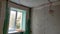 Renovation of the apartment, view of the ceiling and window, plastered walls