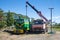 Renovation of the locomotive with the aid of the crane on the chassis of Russian Kamaz-64112 car at the railway station of Dalat