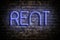 Rent. Neon inscription on the background of an old brick wall. Business. Real Estate