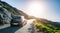 Rental car in spain mountain landscape road at sunset