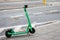 Rental electric scooter, Bolt electric scooters parked in a row on a sidewalk. Modern ride sharing, urban transportation