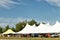 Rental party tents set up at an event.