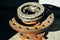 Repair of car brake discs. Hub and brake discs with pads in close-up analysis. Urgent repair in car service