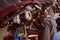 Repair man fixing car in repair station