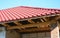 Repair old house with renovation and new metal roof installation and repair wooden trusses.