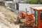 Repair of roads along Museo Solar, San Antonio, Mitad del Mundo, Quito. Transport works, a tractor, heavy machinery. 04.09.2018