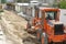 Repair of roads along Museo Solar, San Antonio, Mitad del Mundo, Quito. Transport works, a tractor, heavy machinery. 04.09.2018