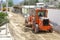 Repair of roads along Museo Solar, San Antonio, Mitad del Mundo, Quito. Transport works, a tractor, heavy machinery. 04.09.2018