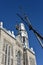 Repair of the steeple of the church of Saint-Pie in Quebec with two cranes