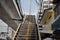 Repairing the cement stairway to the outdoor overpass