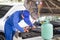 Repairman check and fixed car air conditioner system, Technician checked car air conditioning system refrigerant recharge, Air