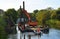 Repairs to the riverbank of the River Great Ouse at St Neots Cambridgeshire, Equipment on floating pontoon being used to drive in