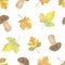 Repeat pattern of and drawn watercolor green and yellowish autumn tree leaves and mushrooms