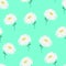 Repeat pattern of white ox-eye daisy flowers and green leaves on the trendy aqua menthe background