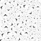 Repeatable geometric pattern with scattered, random shapes