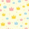 Repeated colored crown and round dots. Cute girly seamless pattern.