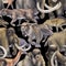 Repeated seamless pattern of a watercolor prehistoric animals