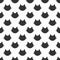 Repeated silhouettes of cat`s heads. Cute seamless pattern.