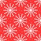 Repeated snowflakes painted by hand with brush. New Year seamless pattern.