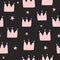Repeating crowns and stars drawn by hand. Simple seamless pattern for little princesses.