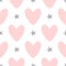 Repeating hearts and stars drawn by hand. Cute seamless pattern.