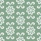 Repeating ornament of flowers and curls. Seamless pattern.