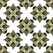 Repeating ornamental pattern desig. Diamond tiles black and old gress green
