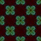 Repeating ornamental pattern desig. Green and blue flames on dark background