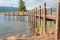 Repeating pattern of wooden poles in a jetty