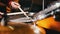 Repetition. Girl playing drums in the studio. Only hands shown