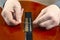 Replacement and insertion of nylon strings in a classical guitar. lesson for a musician