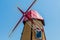 Replica of Dutch windmill on mountaintop