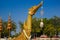 Replica of Royal Barge Suphannahong in the shape of a mythical swan and a crystal ball hanging from its teeth.