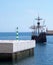 the replica santa maria sailing ship leaving funchal harbor entrance for a cruise around madeira