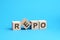 repo - text on wooden blocks, business concept, blue background