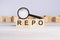 REPO word made with wooden blocks. can be used for business, marketing and education concept