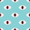 Reptile eyes seamless pattern on a mint background