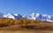 Republic of Altai. Snowy peaks of the north chui range, autumn taiga