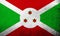 The Republic of Burundi National flag. Grunge Background