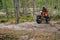 REPUBLIC OF KARELIA, RUSSIA - CIRCA JUNE, 2022: Off-road tournament Ladoga Trophy 2022 in Karelia. A motorcyclist a