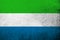 The Republic of Sierra LeoneSalone. National flag. Grunge background