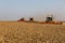 Republic of Tatarstan - August 5, 2020: Combine harvester of wheat in a summer landscape of endless fields
