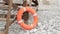 Rescue buoy on the beach. Lifebuoy.