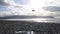 Rescue helicopter flying over scenic coast in North Wales