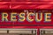 Rescue lettering word on red