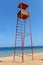 Rescue tower on the beach near the sea