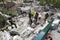 Rescue workers on rubble after earthquake, Pescara del Tronto, Italy